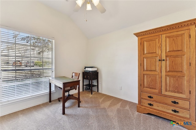 office area with light colored carpet, a ceiling fan, and vaulted ceiling