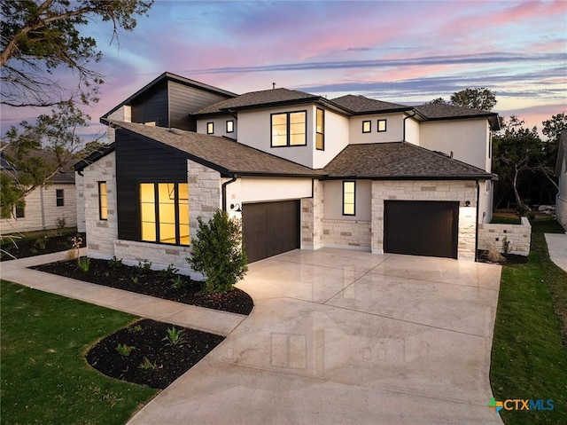 view of front of property featuring a garage