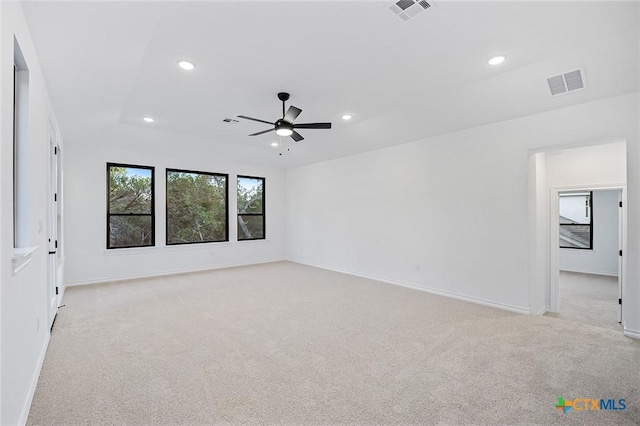 carpeted empty room with ceiling fan