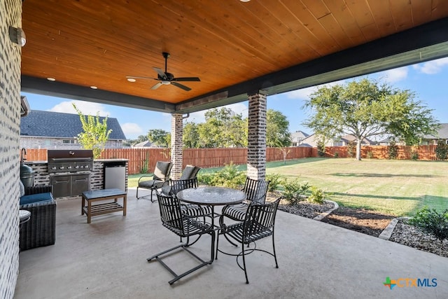 view of patio / terrace featuring area for grilling and ceiling fan