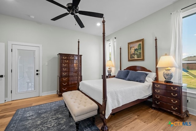 bedroom featuring ceiling fan and light hardwood / wood-style flooring