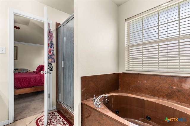 2004 Excel Dr, Killeen, TX 76542 - full bathroom with connected bathroom, a stall shower, a bath, and tile patterned floors