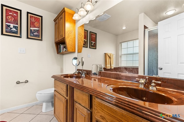 2004 Excel Dr, Killeen, TX 76542 - full bathroom featuring tile patterned floors, double vanity, and a shower stall