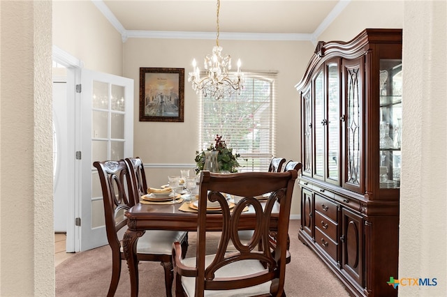 2004 Excel Dr, Killeen, TX 76542 - dining space featuring light colored carpet, a chandelier, and crown molding