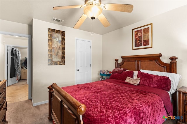 2004 Excel Dr, Killeen, TX 76542 - bedroom with light carpet, ceiling fan, and light tile patterned floors