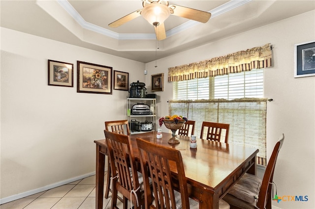 2004 Excel Dr, Killeen, TX 76542 - dining space featuring a raised ceiling, crown molding, ceiling fan, and light tile patterned flooring