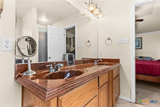2004 Excel Dr, Killeen, TX 76542 - bathroom with connected bathroom, double vanity, tile patterned floors, and ornamental molding