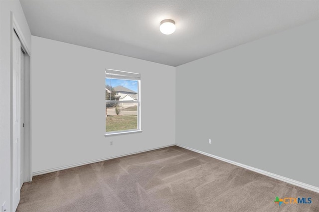 9301 Bellgrove Ct, Killeen, TX 76542 - unfurnished bedroom featuring carpet flooring and a closet