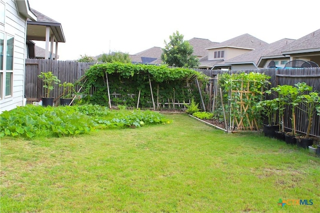 2961 Grove Way, Seguin, TX 78155 - fenced backyard featuring a garden