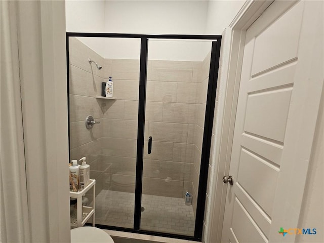 2961 Grove Way, Seguin, TX 78155 - bathroom with a shower stall and toilet