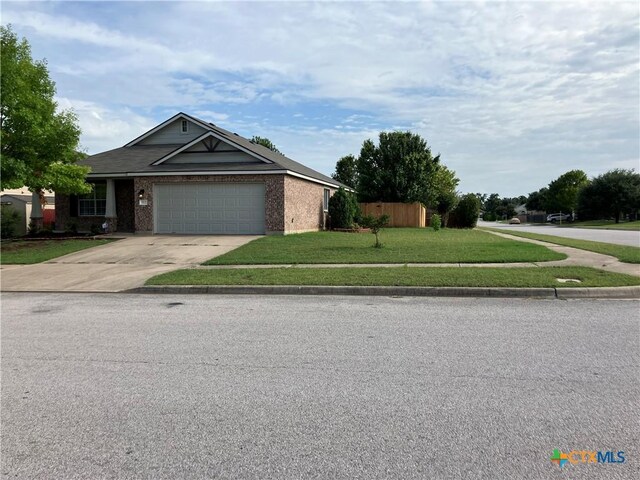 512 Constellation Dr, Killeen, TX 76542 - single story home featuring concrete driveway, a garage, and brick siding