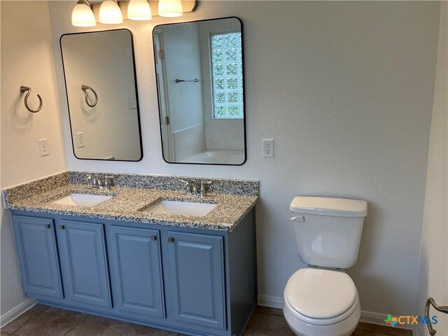 512 Constellation Dr, Killeen, TX 76542 - full bathroom with double vanity and toilet