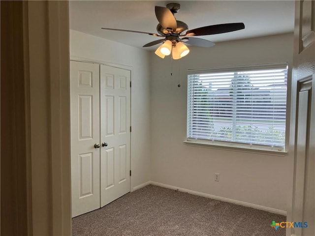 512 Constellation Dr, Killeen, TX 76542 - unfurnished bedroom featuring carpet flooring, a closet, and a ceiling fan