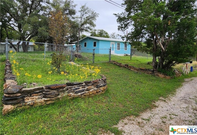 106 Beach Dr, Sunrise Beach, TX 78643 - view of yard featuring a gate