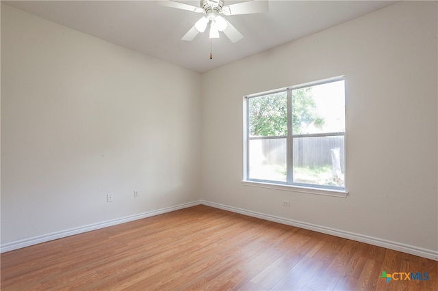 unfurnished room featuring ceiling fan and light hardwood / wood-style floors