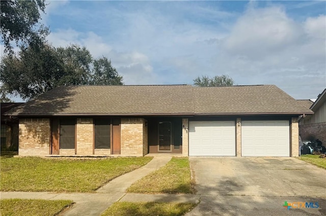 ranch-style house with a front yard and a garage