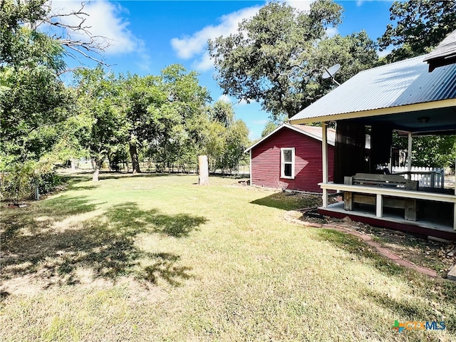 view of yard with a deck