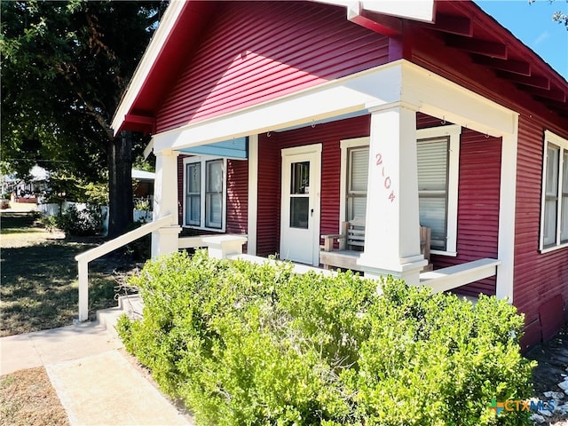 exterior space featuring covered porch