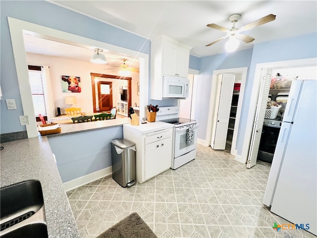 kitchen featuring white cabinetry, white appliances, and ceiling fan