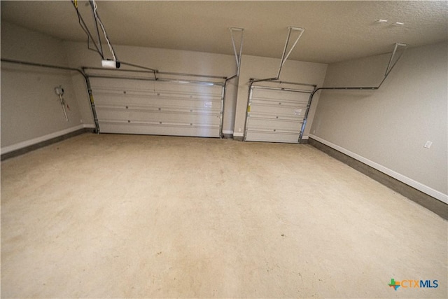 213 Fillmore Fls, Cibolo, TX 78108 - garage with baseboards and a garage door opener