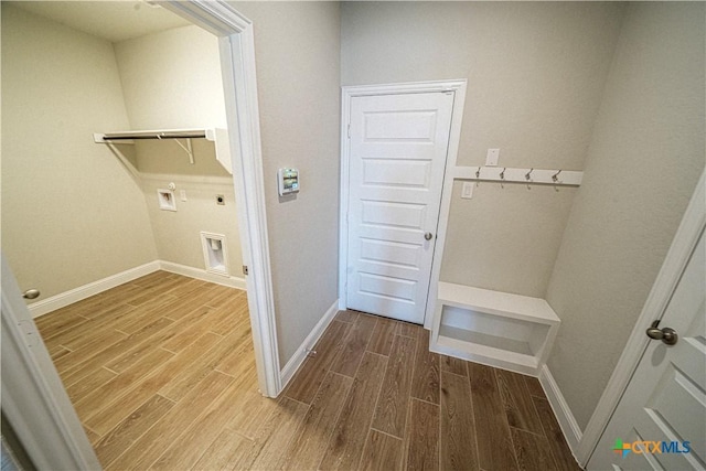 213 Fillmore Fls, Cibolo, TX 78108 - laundry room featuring electric dryer hookup, wood finished floors, hookup for a washing machine, and baseboards
