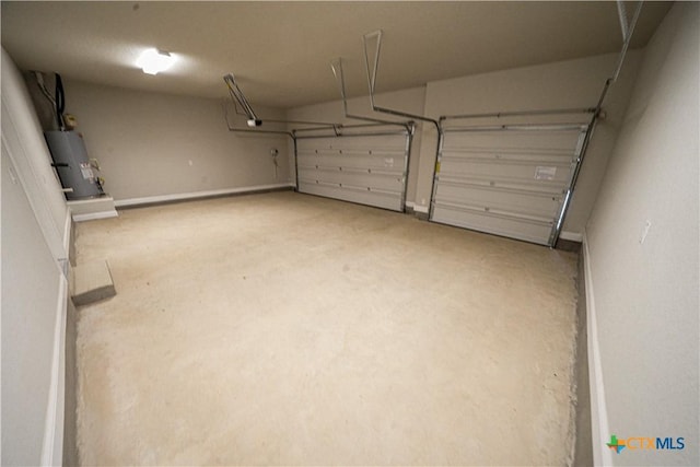 213 Fillmore Fls, Cibolo, TX 78108 - garage with baseboards and gas water heater