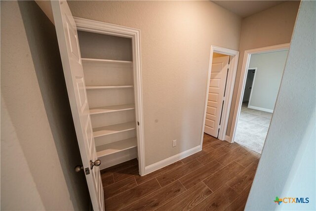 empty room featuring hardwood / wood-style flooring