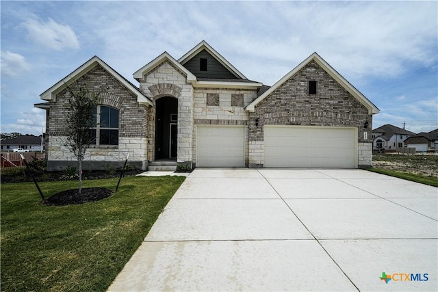 213 Fillmore Fls, Cibolo, TX 78108 - french country home featuring stone siding, a front lawn, concrete driveway, and an attached garage