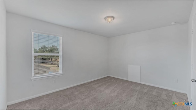 300 Jacks Pl, Seguin, TX 78155 - carpeted empty room with baseboards