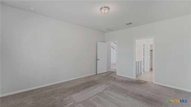 view of carpeted spare room