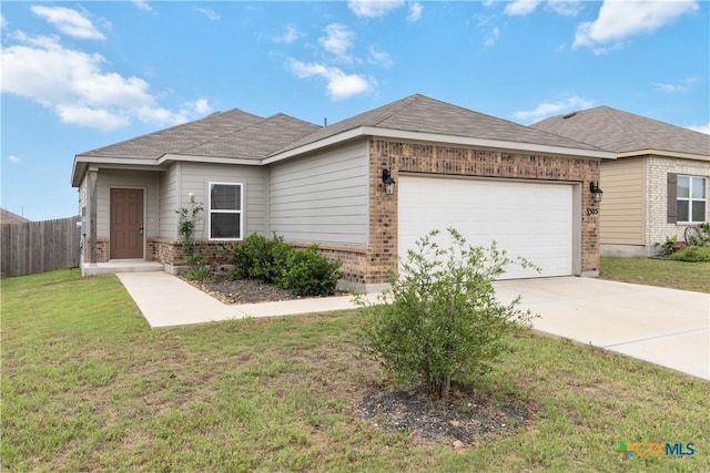 single story home with fence, a garage, driveway, and brick siding