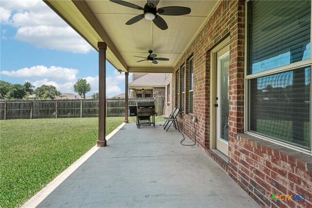 3225 Vineyard Trl, Harker Heights, TX 76548 - fenced backyard with a ceiling fan and a patio area