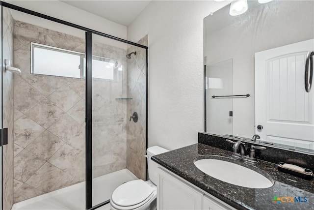 3225 Vineyard Trl, Harker Heights, TX 76548 - bathroom featuring vanity, a stall shower, and a textured wall