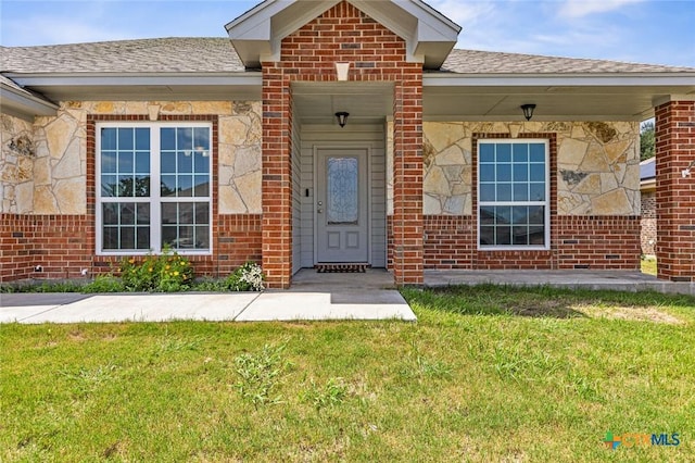 1536 Justice Dr, Copperas Cove, TX 76522 - entrance to property with a yard, a shingled roof, and stone siding