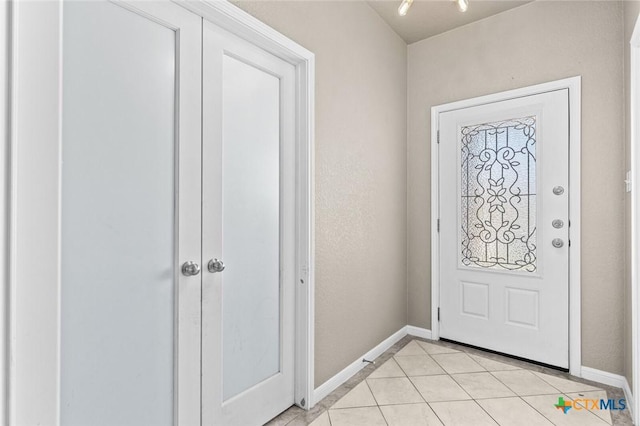 1536 Justice Dr, Copperas Cove, TX 76522 - entrance foyer featuring baseboards and light tile patterned flooring