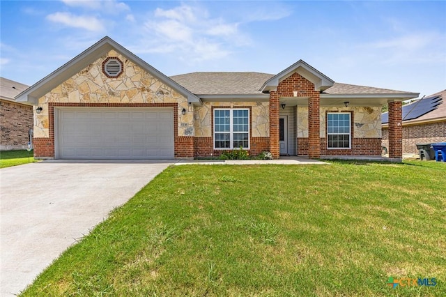 1536 Justice Dr, Copperas Cove, TX 76522 - single story home with driveway, a front yard, a garage, and brick siding