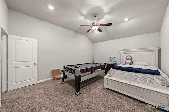 carpeted bedroom featuring vaulted ceiling and ceiling fan