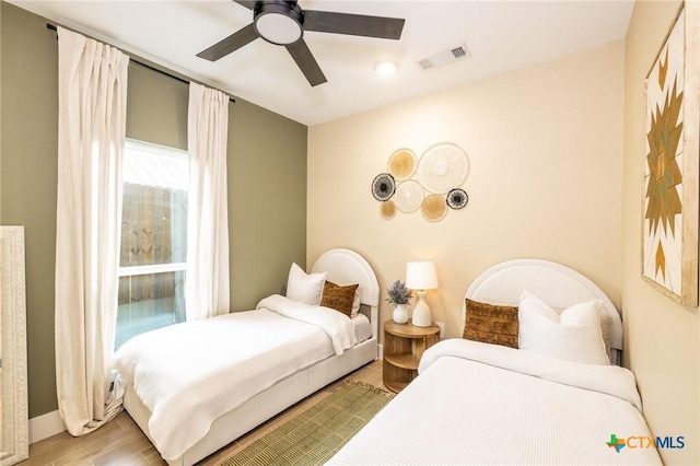 1428 Springwater, Canyon Lake, TX 78133 - bedroom with wood finished floors and a ceiling fan
