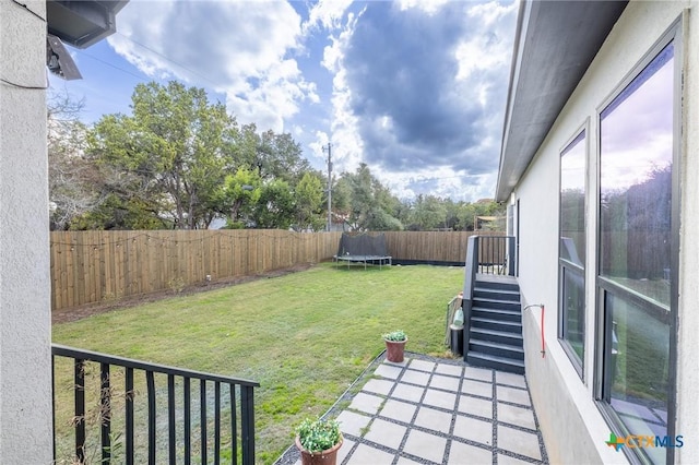 1428 Springwater, Canyon Lake, TX 78133 - fenced backyard with a trampoline