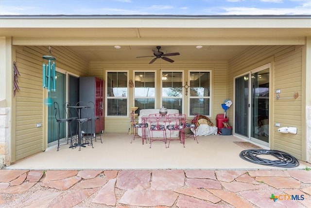 view of patio with ceiling fan