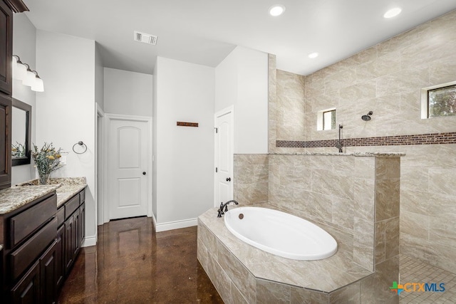 750 Cambridge Dr, New Braunfels, TX 78132 - full bath featuring a bath, vanity, finished concrete floors, a walk in shower, and recessed lighting