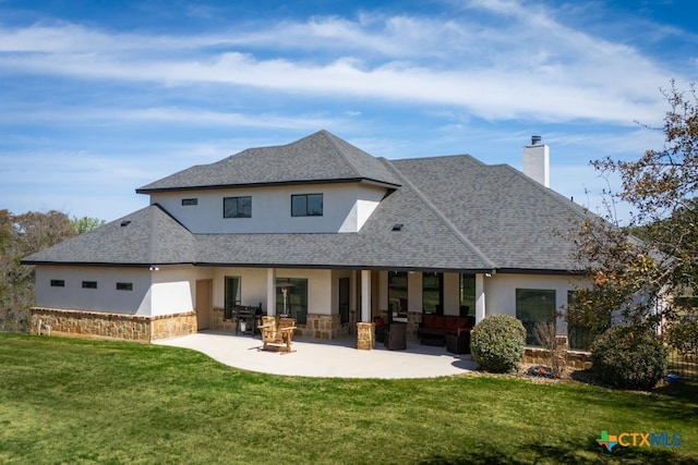 750 Cambridge Dr, New Braunfels, TX 78132 - back of house featuring stucco siding, a chimney, and a lawn