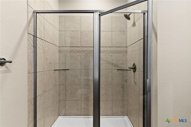 bathroom with walk in shower