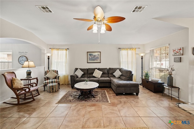 living room featuring ceiling fan, visible vents, and light tile patterned flooring