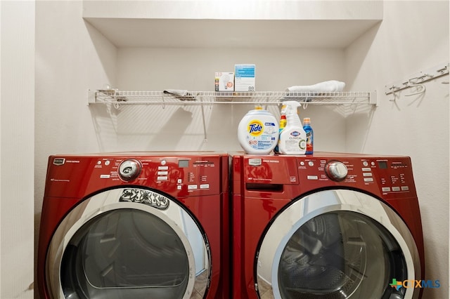 laundry room with washer and dryer and laundry area