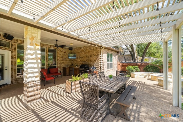 view of patio with a grill, a pergola, and ceiling fan