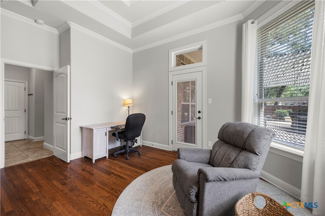 home office with ornamental molding and dark hardwood / wood-style floors