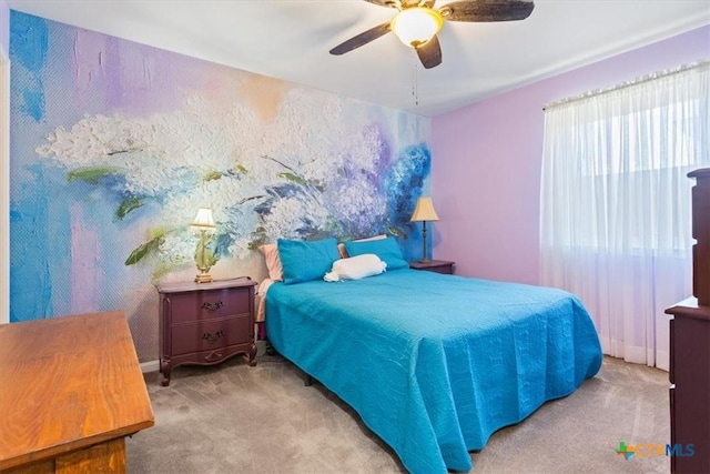 bedroom featuring carpet and ceiling fan