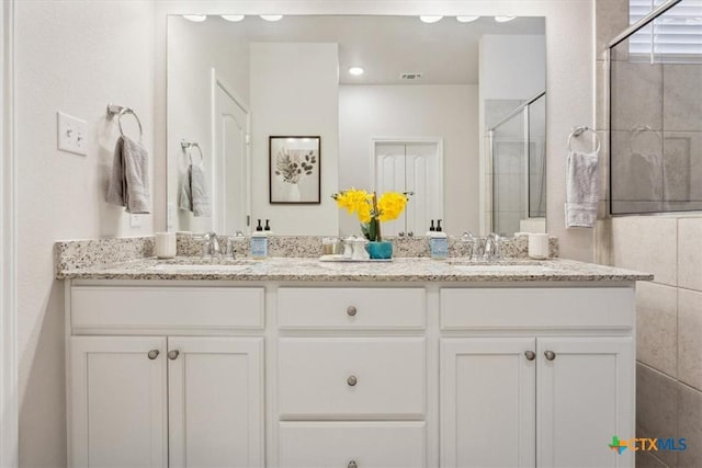 3703 Mccleland Creek Trl, Temple, TX 76502 - full bath featuring a stall shower and double vanity