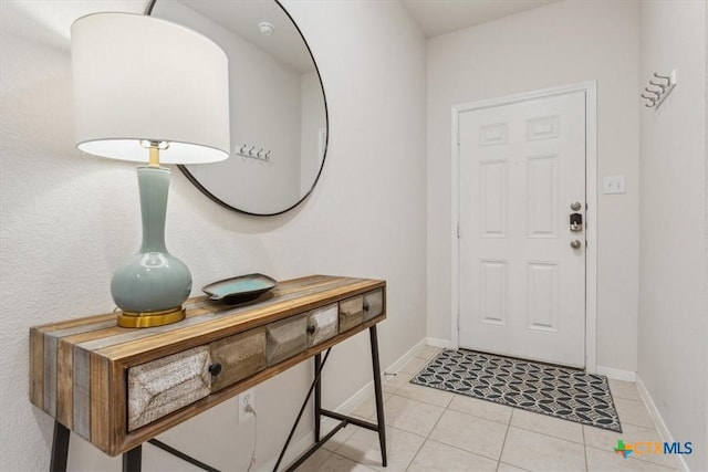 3703 Mccleland Creek Trl, Temple, TX 76502 - entrance foyer with light tile patterned flooring and baseboards